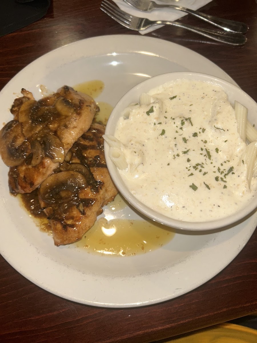 Chicken marsala, grilled with a portion of Alfredo on the side with gluten-free noodles, of course great flavor to the noodles