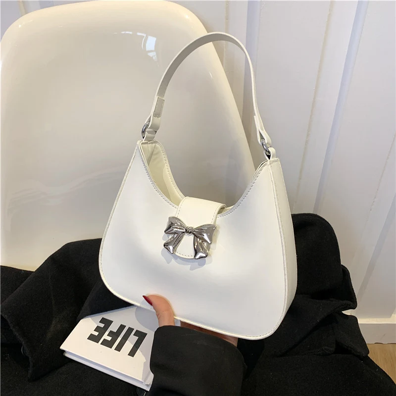 Bolsa feminina estilo Western simples Elegância e praticidade em um só acessório. Perfeita para o dia a dia, combina com diversos looks. Design atemporal.