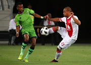 Fagrie Lakay of Ajax Cape Town challenged by Molemo Mekoa of Platinum Stars during the Absa Premiership 2017/18 football match between Ajax Cape Town and Platinum Stars at Cape Town Stadium, Cape Town on 12 January 2018.