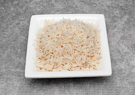 Plain Rice Served With Gravy Or Raita