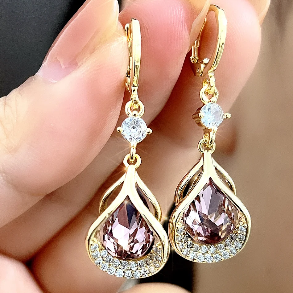 Boucles d'oreilles haut de gamme avec micro-incrustations de zircon, élégance exquise et luxe léger. Brillez avec raffinement.