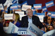 US Democratic presidential candidate Senator Bernie Sanders celebrates with his wife Jane after being declared the winner of the Nevada Caucus while holding a campaign rally in San Antonio, Texas, US, February 22, 2020.  