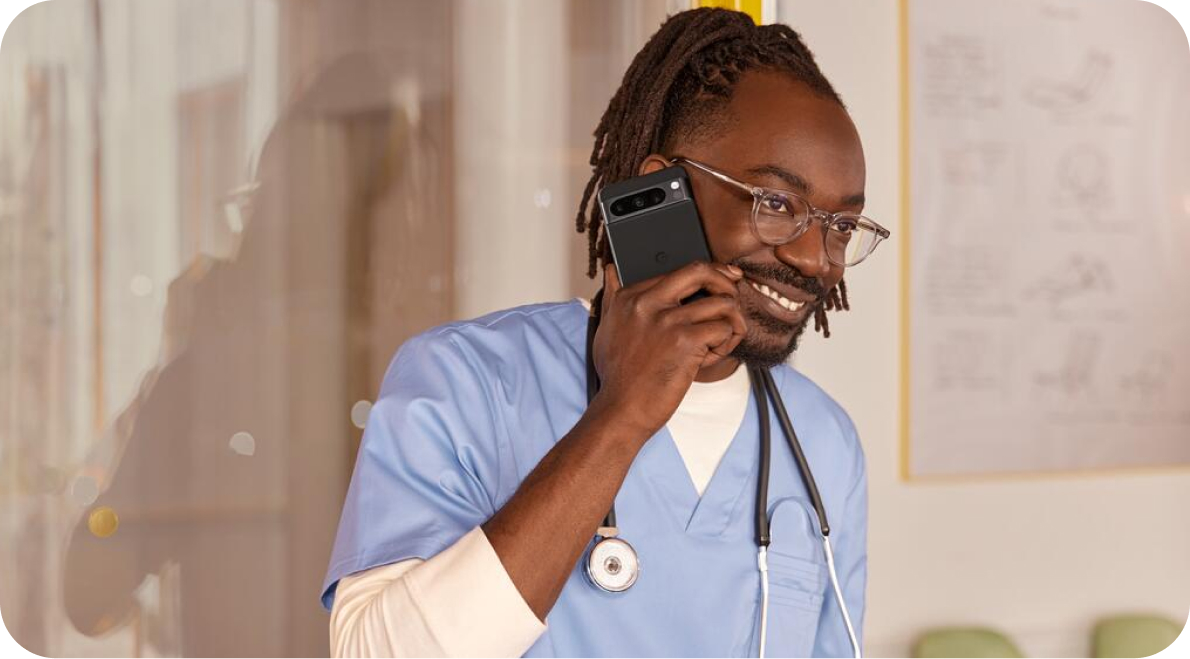 A doctor taking a call on his Pixel phone.