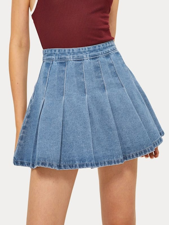 A pleated flippy hem denim skirt