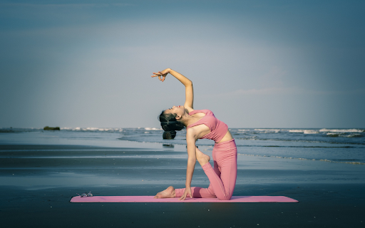 Practice yoga on the beach