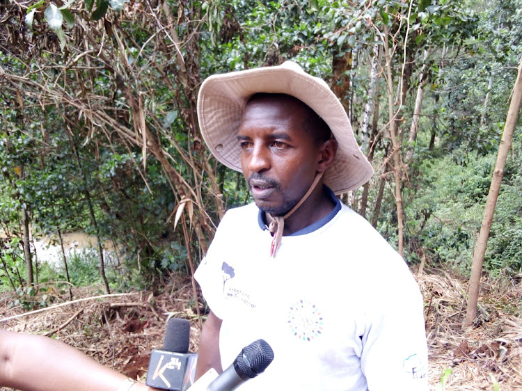 Kenvo Director Nelson Muiru speaks to journalists at Gatamaiyu Secondary School on Tuesday