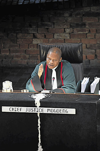 Constitutional Court Judge President Mogoeng Mogoeng listens to arguments in the dispute between Cape Judge President John Hlophe and the court.