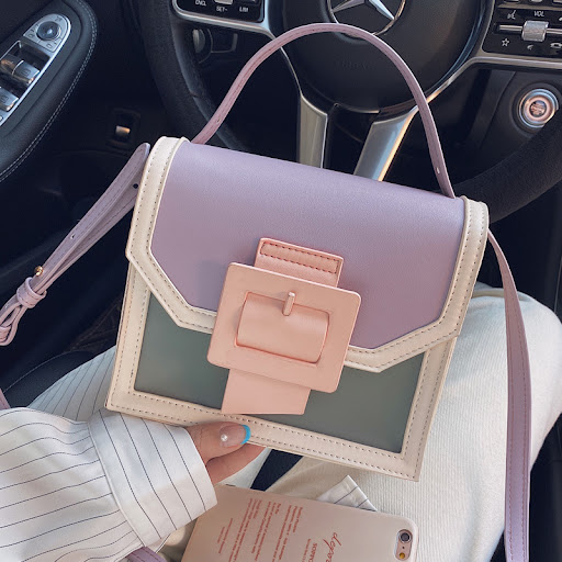 Title 2, Premium handbag crafted from luxurious leather,...