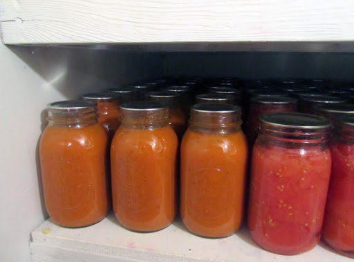 Here are the 21 quarts of soup, in my pantry, right next to the canned tomatoes.