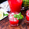 Thumbnail For Garnish A Glass Of Basil-infused Watermelon Lemonade With Basil And A Lemon Slice.