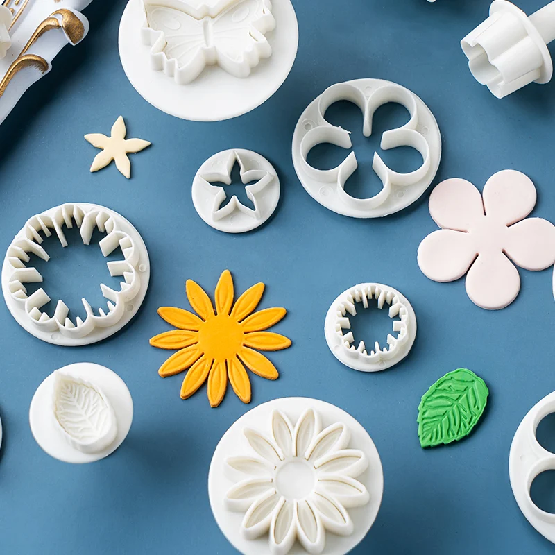 Kit complet de moules à gâteau en fondant avec marguerite et papillon, découpoirs en plastique pour la pâtisserie, parfait pour décorer.