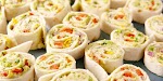 Chicken Avocado Roll-Ups was pinched from <a href="http://www.delish.com/cooking/recipes/a52540/chicken-avocado-roll-ups/" target="_blank">www.delish.com.</a>