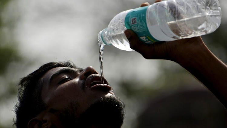 Cooling off during a heatwave in India