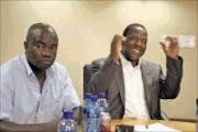 OUT: Bohani Shibambu with board chairperson Sello Rasethaba during yesterday's media briefing. Pic: Chester Makana. 10/11/2009. © Sowetan.