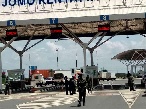 Police officers at the entrance to Jomo kenyatta International Airport in Nairobi.