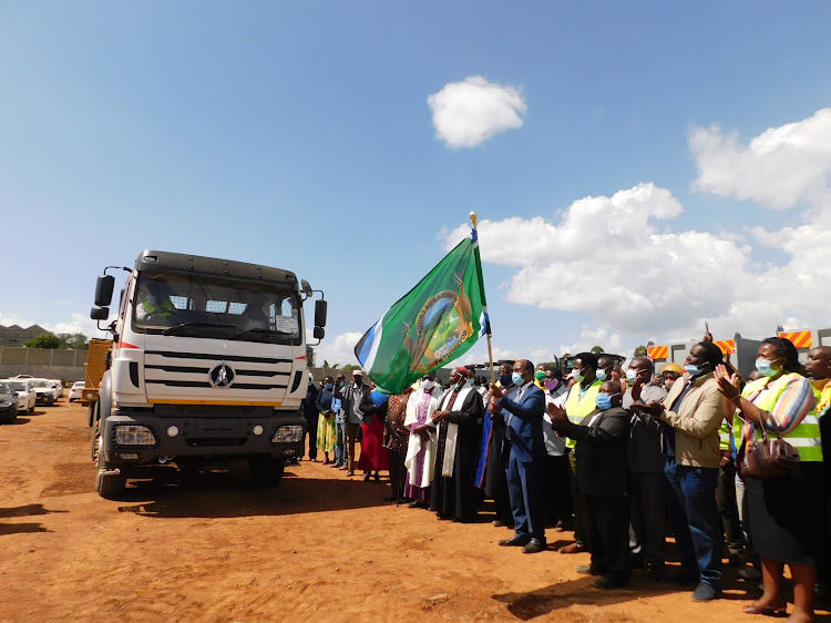 Nyandarua governor Francis Kimemia flags off the new road construction equipment at Ol Kalou stadium on Wednesday,May 27,2020