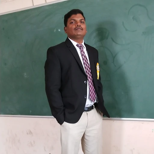 Ashok Kumar Goda, Ashok Kumar Goda is a skilled TGT Social Science teacher with 11 years of experience in teaching. He is certified in Google Ad Words and has a certification in digital marketing. Mr. Goda has experience teaching SST up till class 10 along with managing exams and conducting admission counseling. He is also well-versed in MS Office, and has experience managing the general administration, ERP, and human resources. Mr. Goda has a passion for travelling and watching movies during his free time.