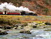 You'll be treated to some spectacular mountain scenery during the 2.5 hour journey from Caernarfon to Porthmadog aboard the Welsh Highland Railway.