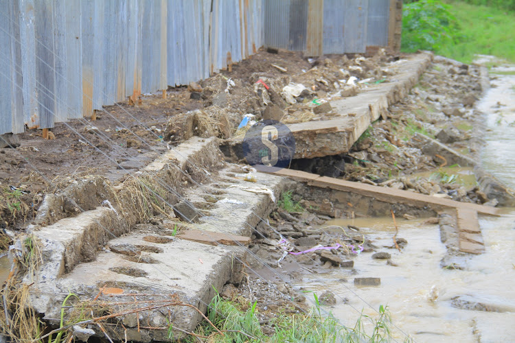 A security wall belonging to the Tuff Foam mattresses company and factory in Athi River that fell due to the heavy ongoing rainfall.