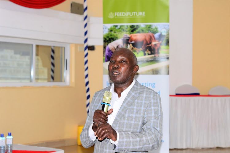 Stawi chief of party Robert Kisyula addresses participants during the co-creation workshop at a Kitui hotel.