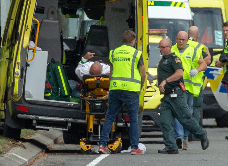 An injured person is loaded into an ambulance following a shooting at the Al Noor mosque in Christchurch, New Zealand, March 15, 2019.