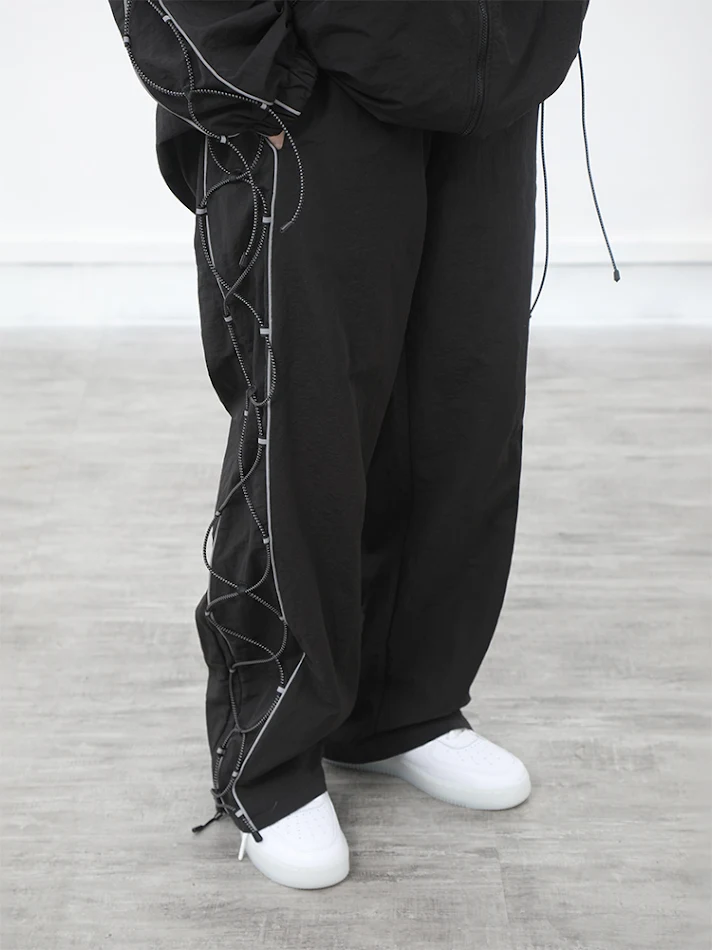 Pantalones largos sueltos de pierna recta con sujeción para libertad y comodidad óptimas. Diseño elegante para uso diario.