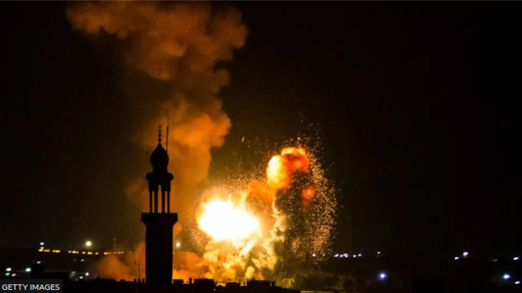 Smoke rises above the southern Gaza Strip during an Israeli air strike.