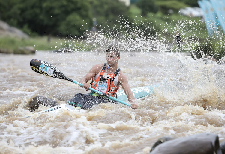 Alan Houston paddling through Mission Rapids at the start of Day 1 of the Dusi Canoe Marathon.