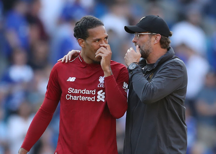 Liverpool manager Juergen Klopp talks with Virgil van Dijk