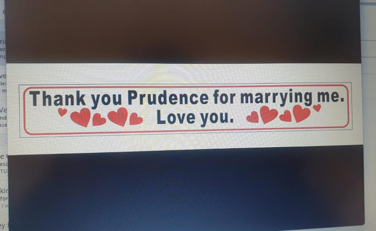Joseph Ndlovu held up a sign thanking Prudence for marrying him as he crossed the 2023 Comrades Marathon finish line.
