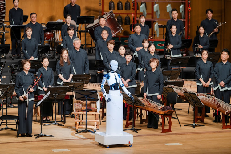 An android robot, EveR 6, is seen as it takes the conductor's podium to lead a performance by South Korea's national orchestra, in Seoul, South Korea, June 30 2023.