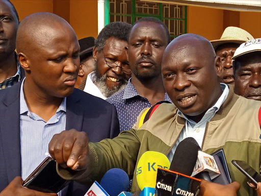 Nandi Hills MP Alfred Keter with his Cheranganyi counterpart Joshua Kuttuny address journalists on Sunday. MATHEWS NDANYI