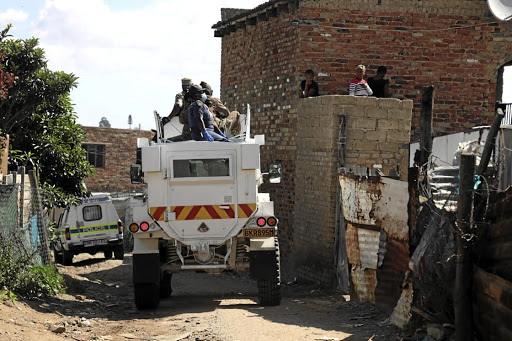 Police and the army patrol in Diepsloot./THULANI MBELE