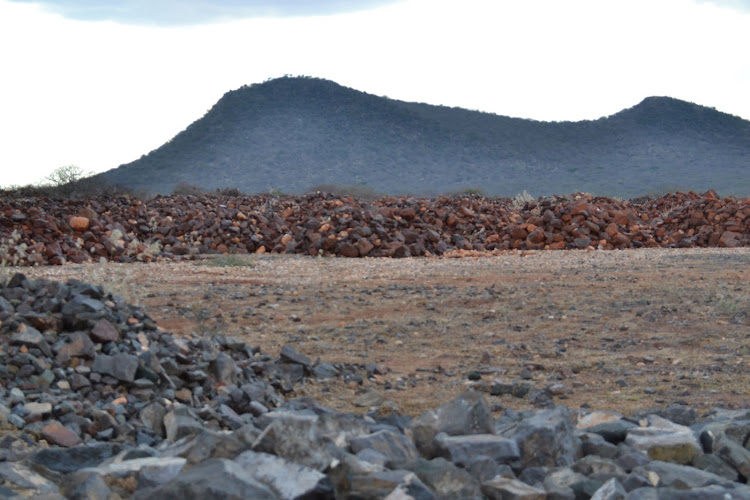 A section of abandoned iron ore heaps at Kishushe. The company is set to resume extraction after months of closure.