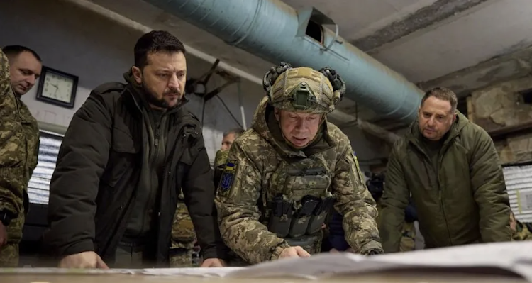 Ukraine President Volodymyr Zelensky with military members.