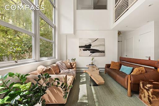Modern living room with sofas and large window - Buy this luxury apartment / penthouse in Brooklyn, 5 rooms, 3 bedrooms
