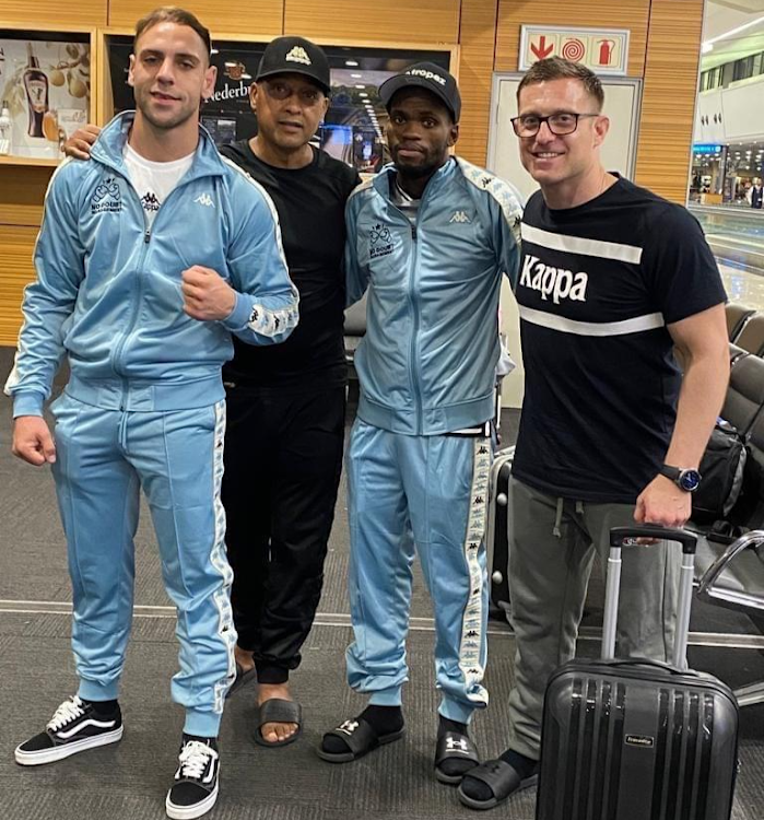 Lerato Dlamini, second from right, at OR Tambo before flying out with his team, trainer Colin Nathan, right, and Shannon Strydom and Bernie Pailman.