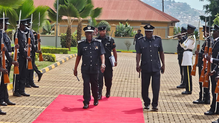 IGP Martin Okoth Ochola arriving, at Naguru police headquarters for the release of the Annual Police Crime report