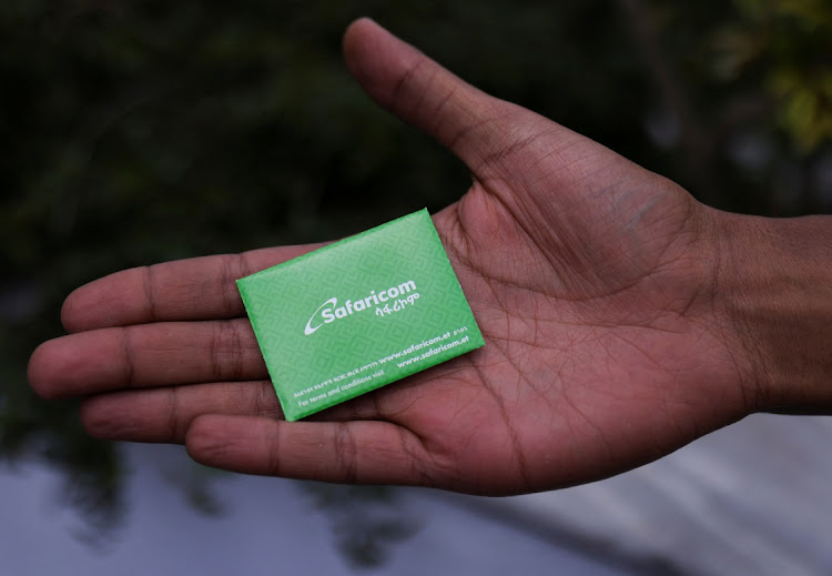 A customer displays the package of a Safaricom Ethiopia SIM card in Addis Ababa, Ethiopia, October 6 2022. Picture: TIKSA NEGERI/REUTERS