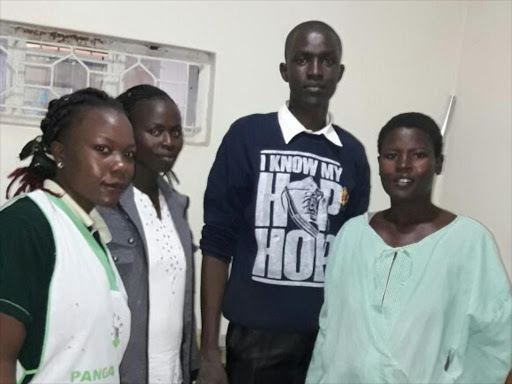 Jacinta Akinyi (R) with her husband at Matata Nursing Home after she gave to five babies, November 12, 2017. /ROBERT OMOLLO