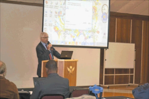 POSITIVE: Head of the Western Cape department of health Professor Craig Househam addresses people on the NHI pilot project in Mitchell's Plain. Photo: UNATHI OBOSE