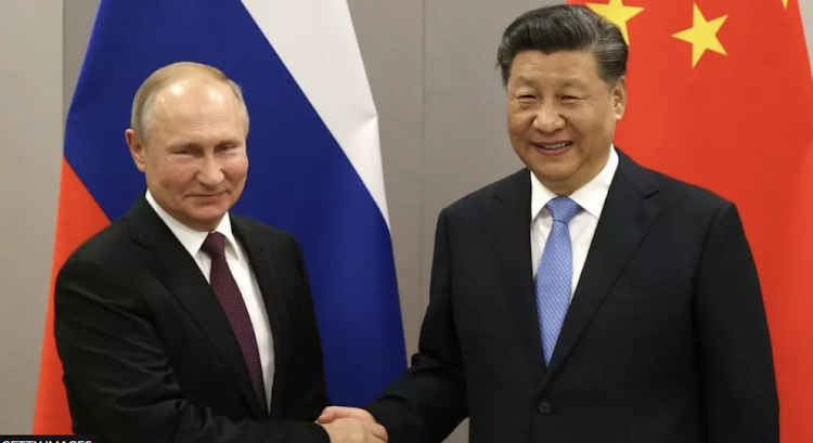 Mr Putin (left) and Mr Xi last met in person in Beijing in February