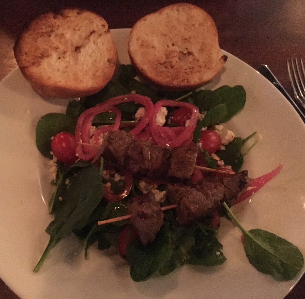 Black and Blue Salad with steak skewers and GF bun in place of bread