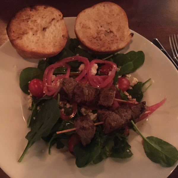 Black and Blue Salad with steak skewers and GF bun in place of bread