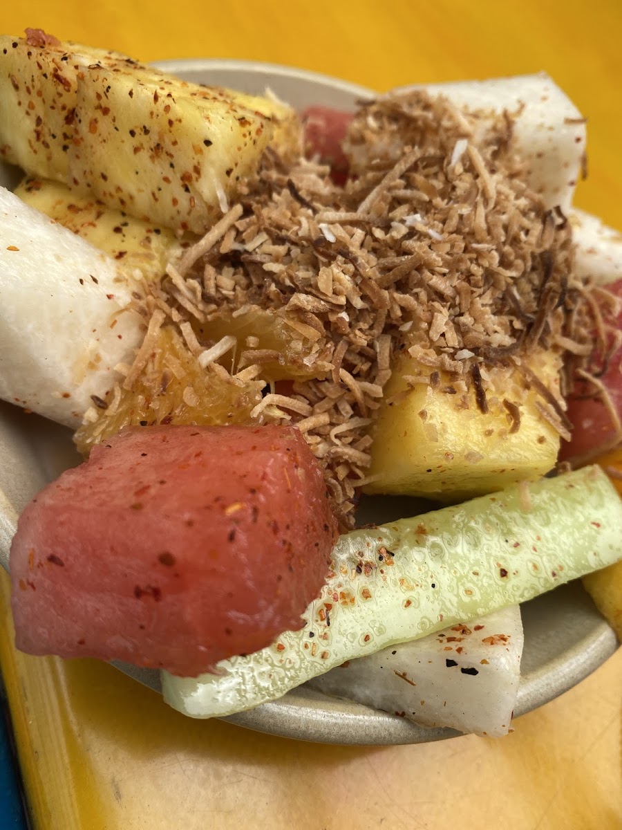 Fruit salad with chile, lime and toasted coconut.