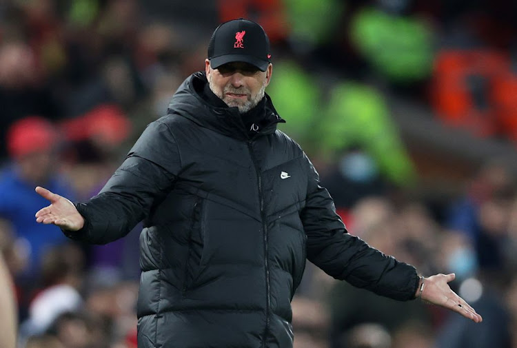 Liverpool manager Juergen Klopp gestures during his side's Premier League match against Newcastle United at Anfield on December 16, 2021