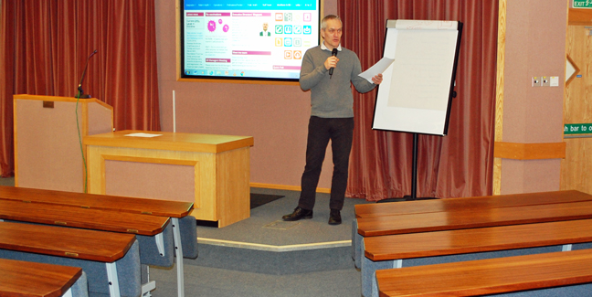 Trainer practicing in an empty lecture room