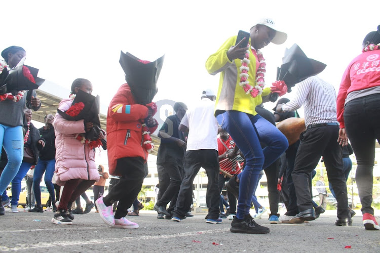 Kenya Pipeline volleyball fraternity cheering squad at the JKIA welcoming their players who jetted in the country from Tunisia for the Africa Club Championships, May 24, 2023