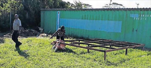 BONE OF CONTENTION: The area behind the EMS station in East London where two sheep were slaughtered Picture: SUPPLIED