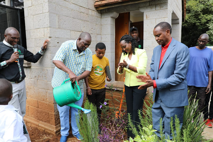 Environment Cabinet Secretary Soipan Tuya with ACK's Archbishop Dr Jackson Ole Sapit planting tree during his 59th birthday